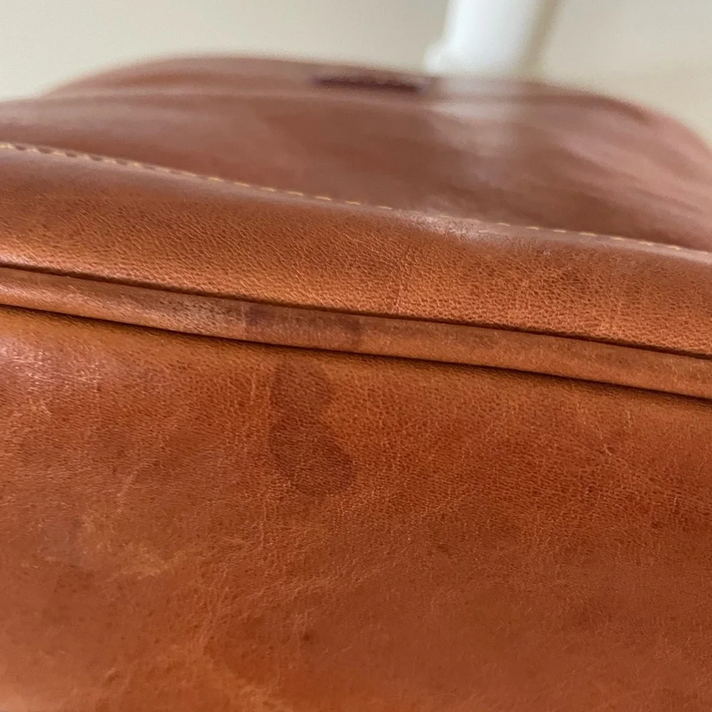 Dooney and Bourke Florentine leather small backpack.